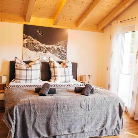 Haus Plattenbichlstrasse - Ferienhaeuser Alpenglueck